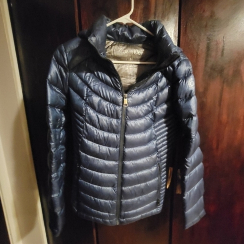 Blue lightweight quilted hooded CK jacket size Medium